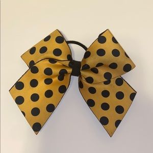 Gold polka dot cheer bow